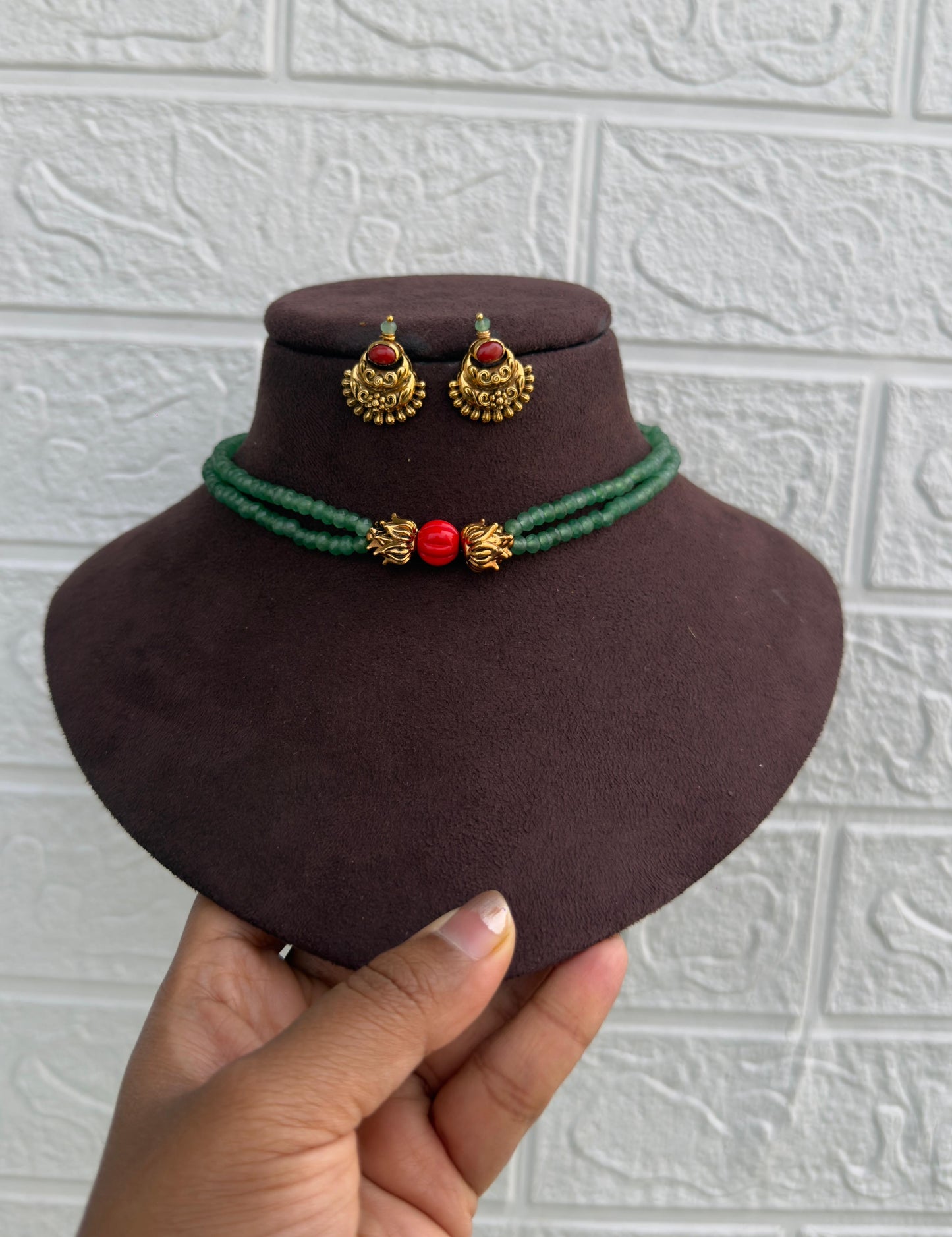 Two layered green beads choker with gold lotus coral bead