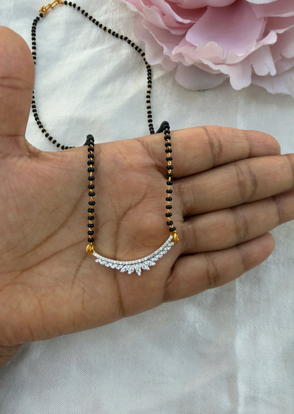 92.5 silver five petal diamond finish black beads necklace