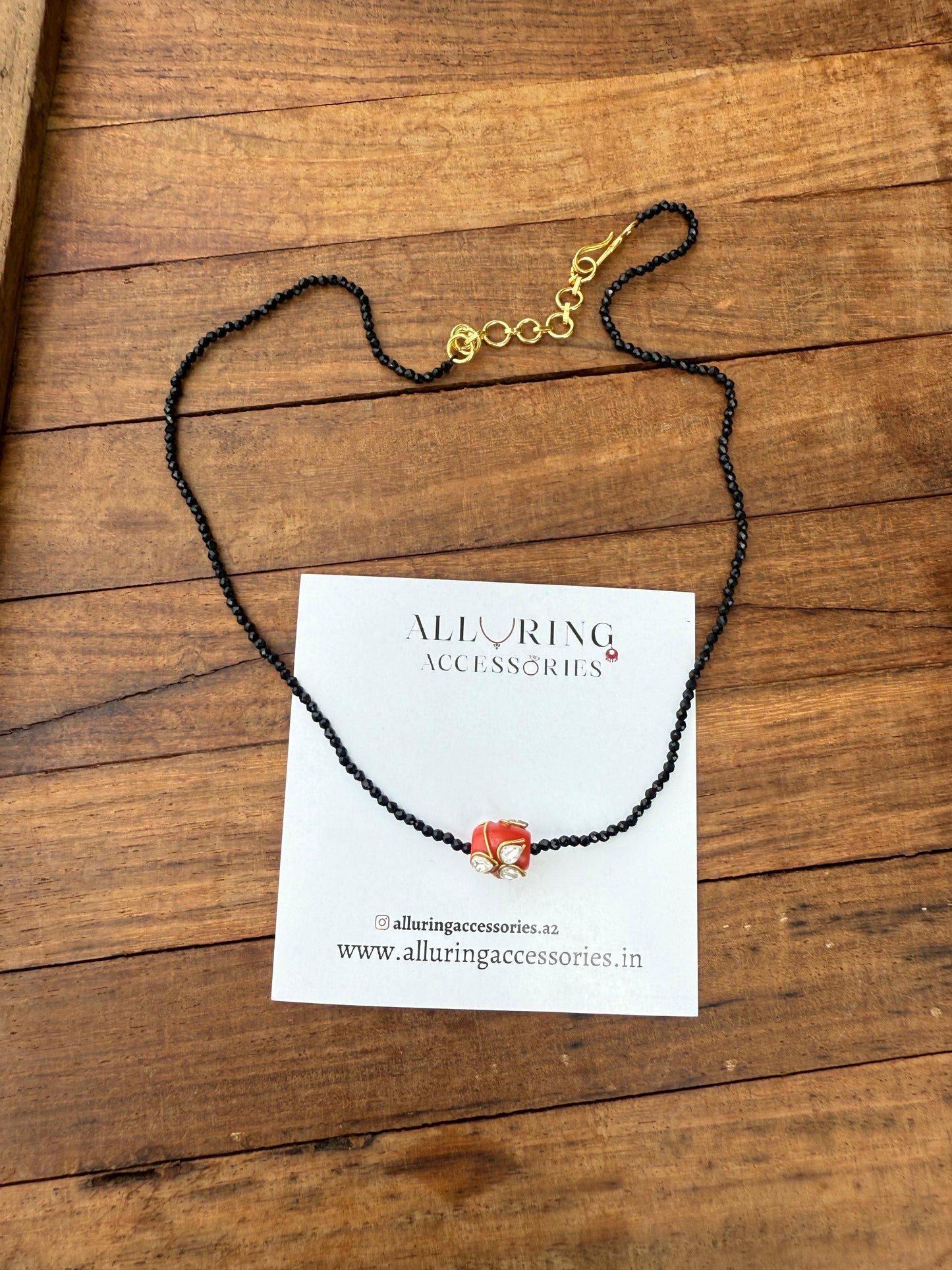 New coral with three kundan black beads necklace