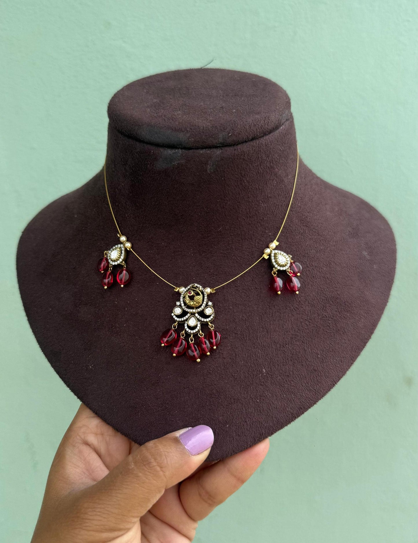 Peacock pearl drops invisible necklace