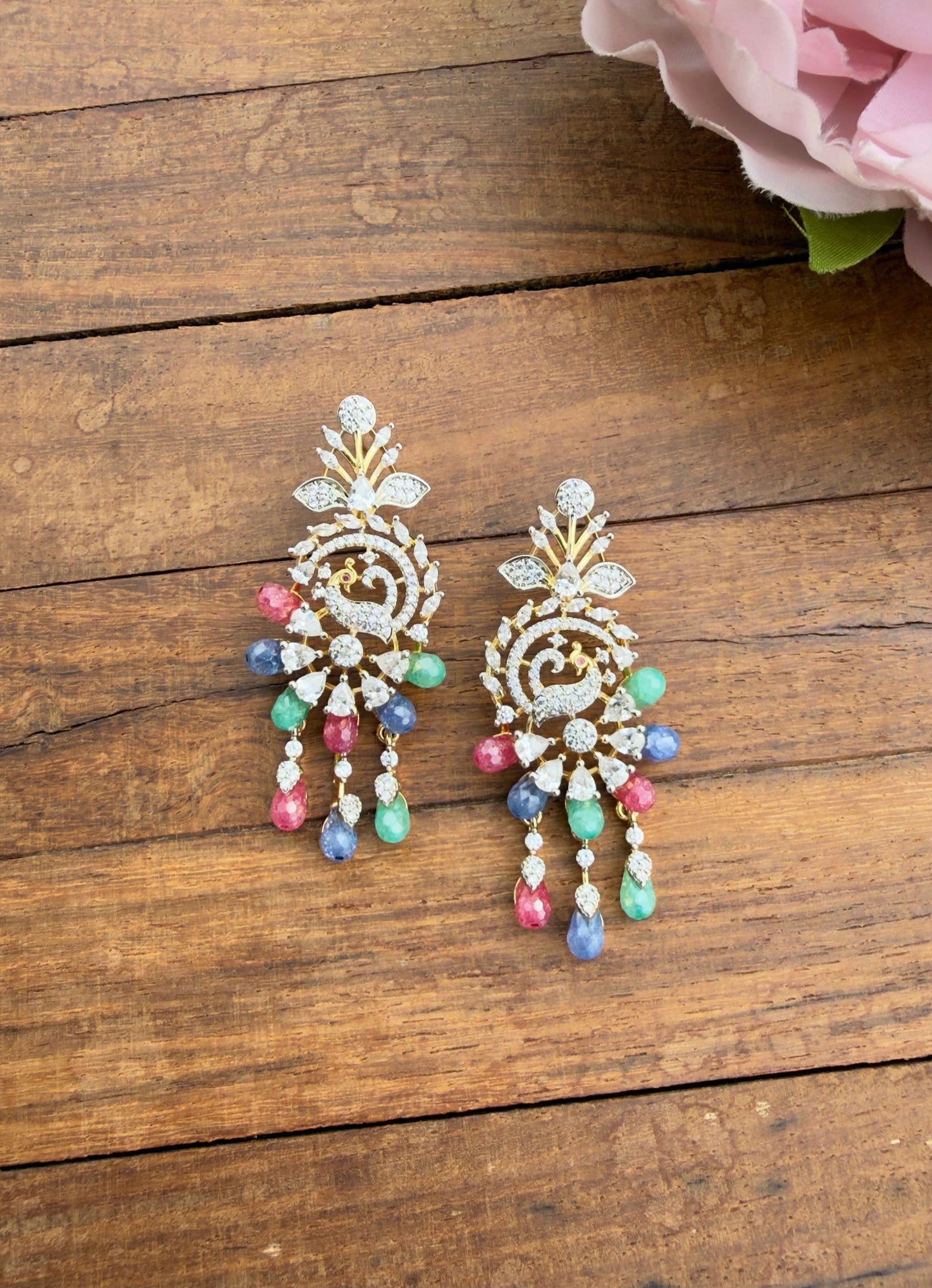 Diamond look alike peacock earrings with tri colour drops