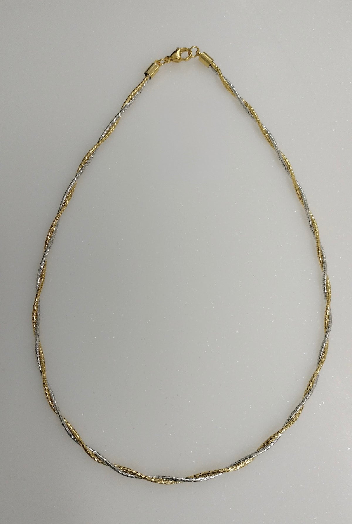 Twisted two line gold and silver shade chain