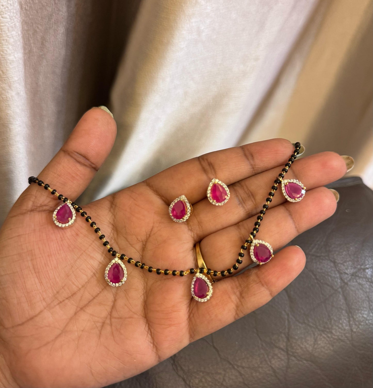 Five pearl drop black beads necklace