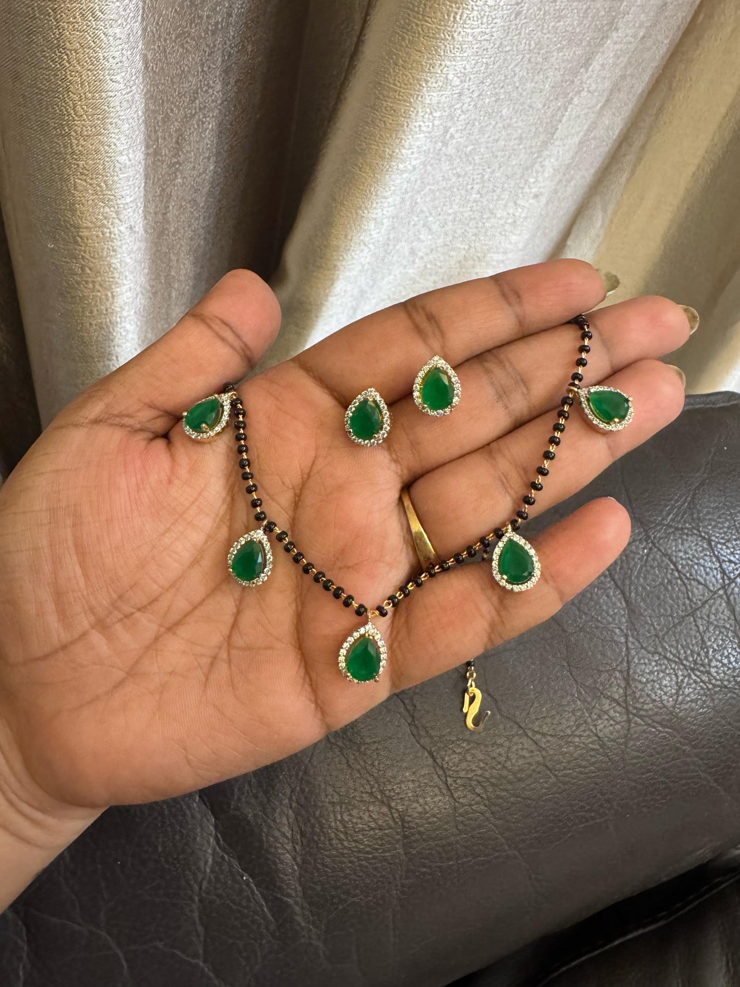 Five pearl drop black beads necklace