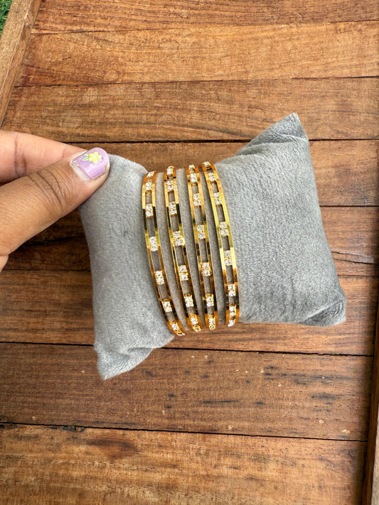 Set of 4 Gold plated sleek stone bagles