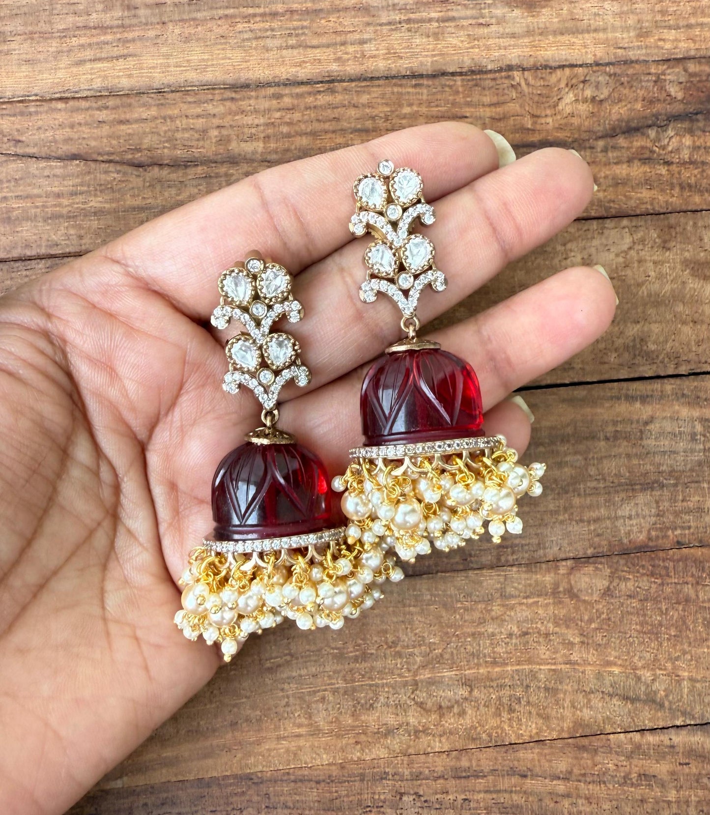 Rosegold flower embossed double layered pearl hanging jhumkas