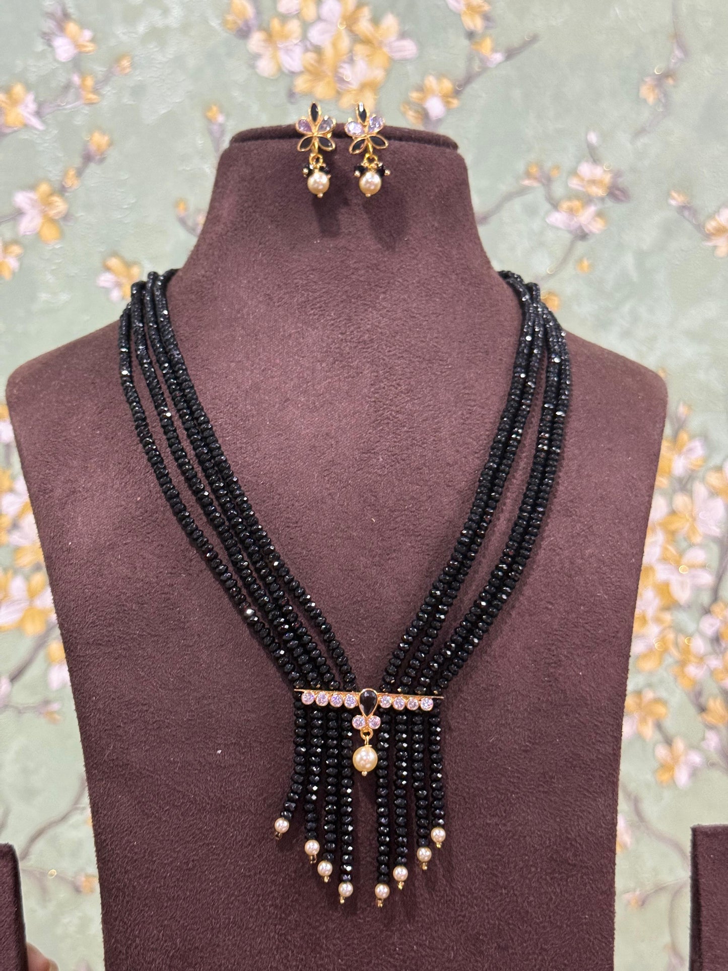 Four layered V shape designer beads necklace with uncut diamonds
