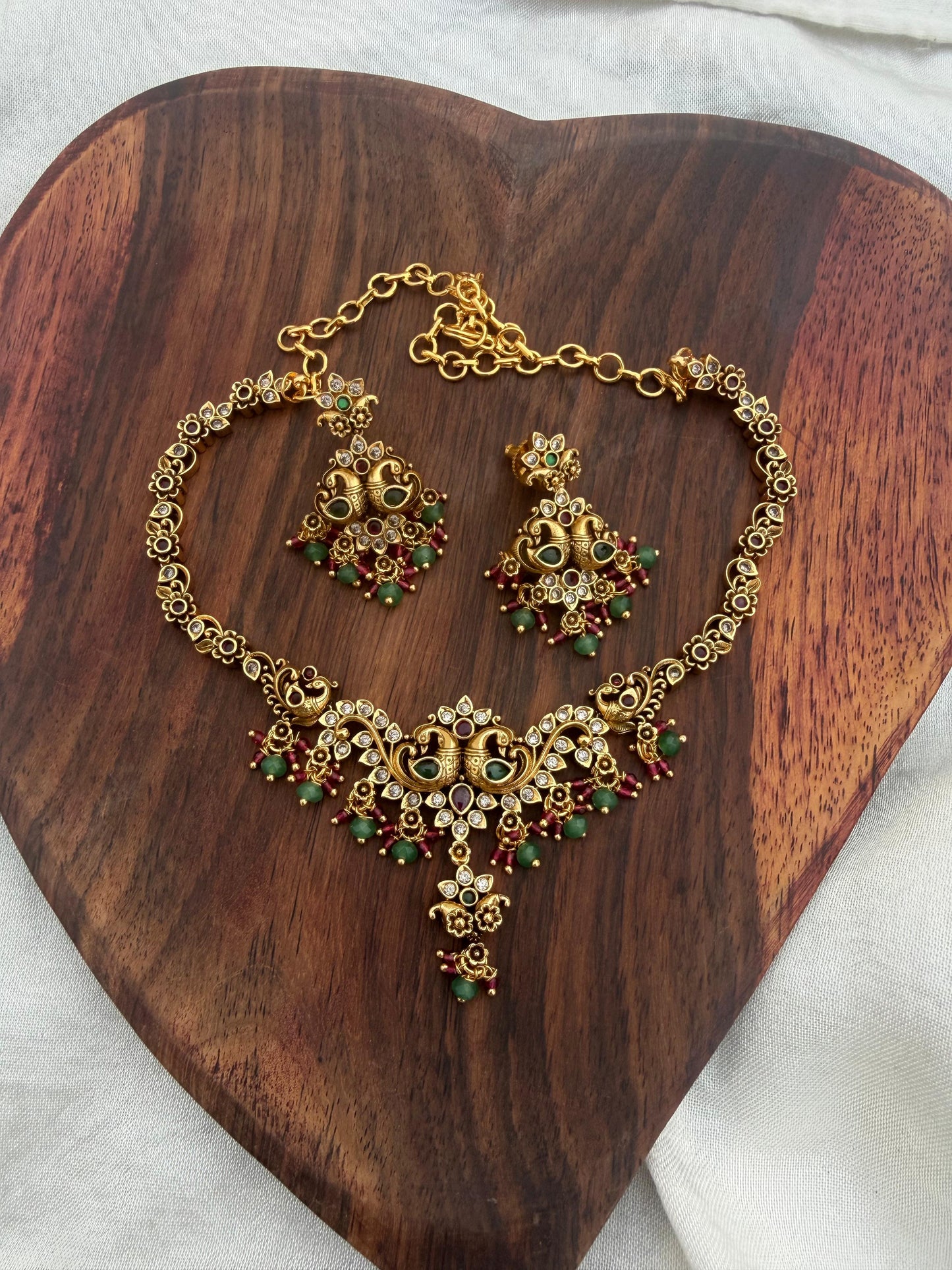 Four peacock mango flower gold necklace with chandbalis