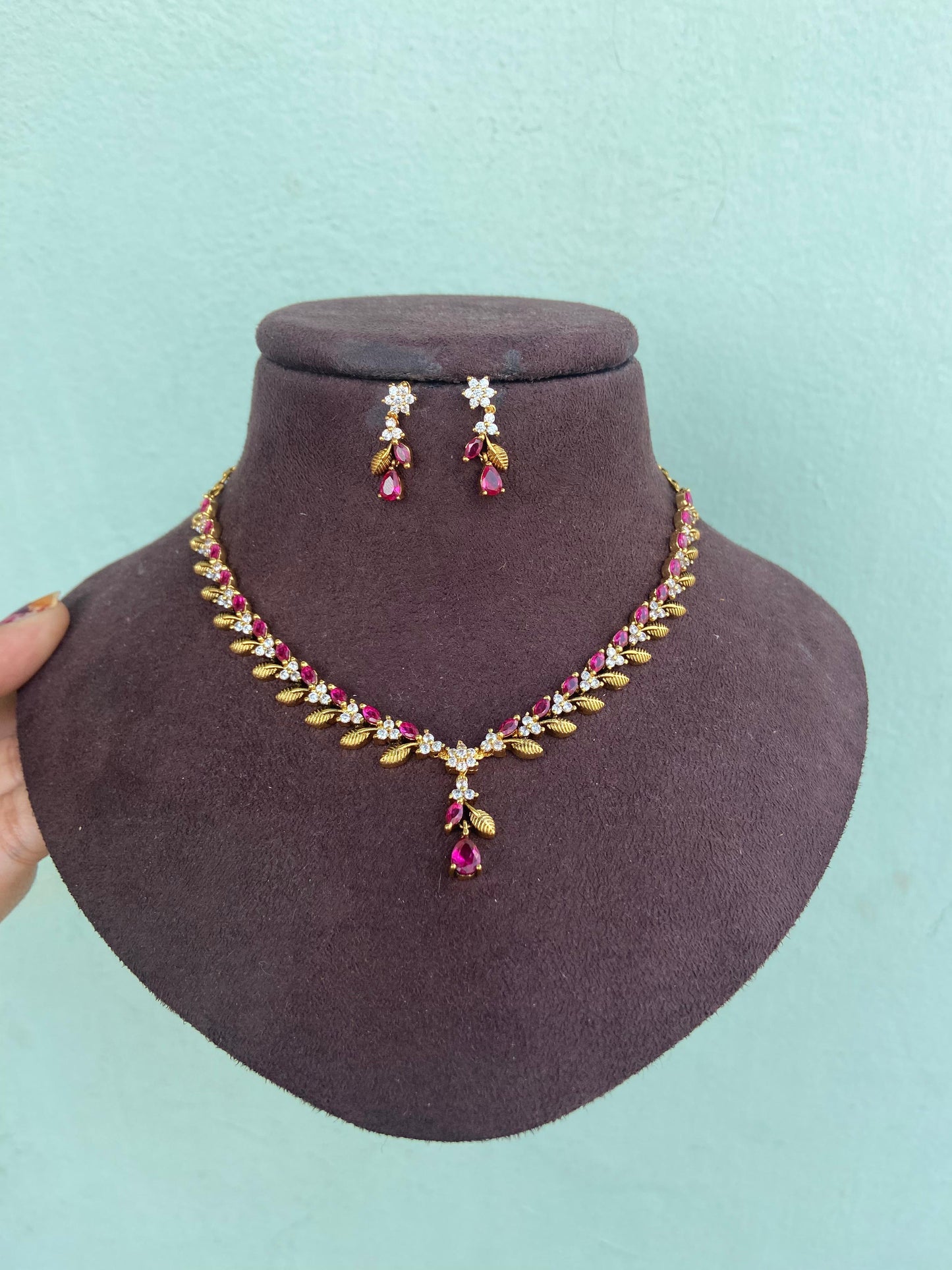 Wine colour leaf diamond necklace