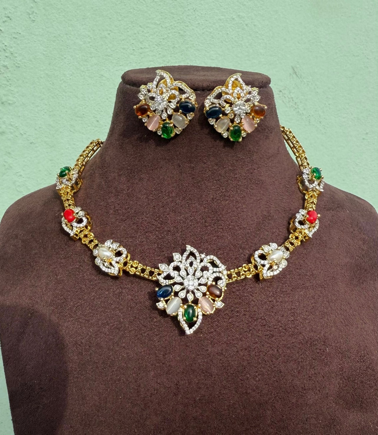 Diamond finish flower embossed navaratan necklace with heavy studs
