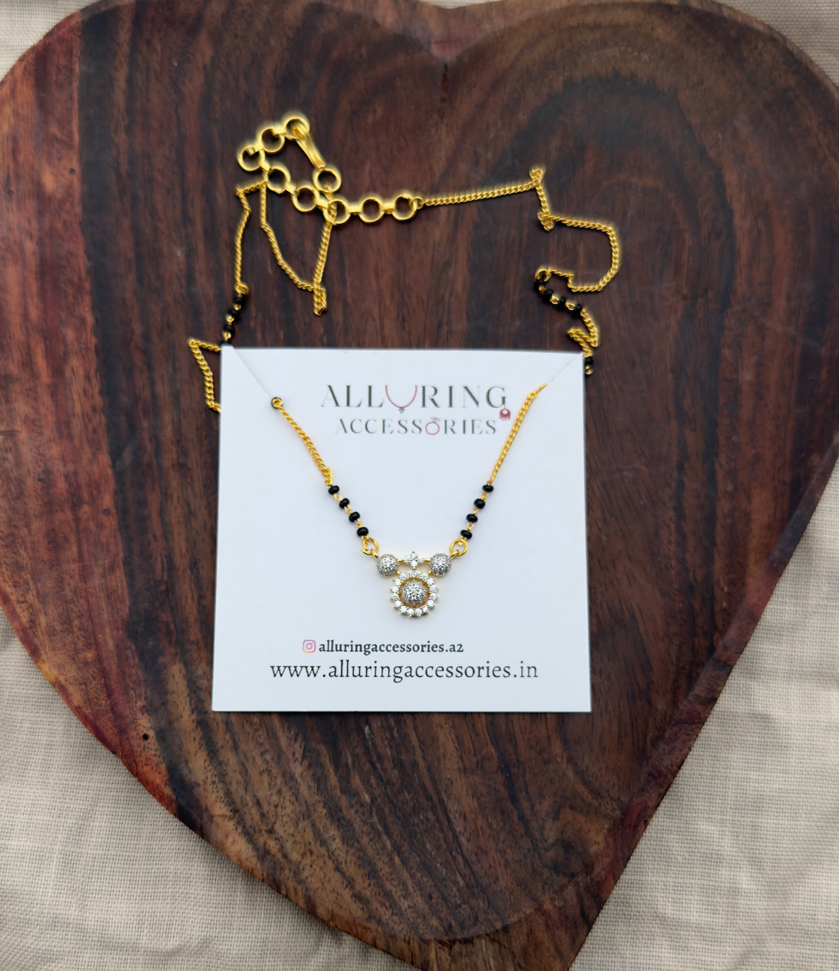 Five round diamond black beads necklace