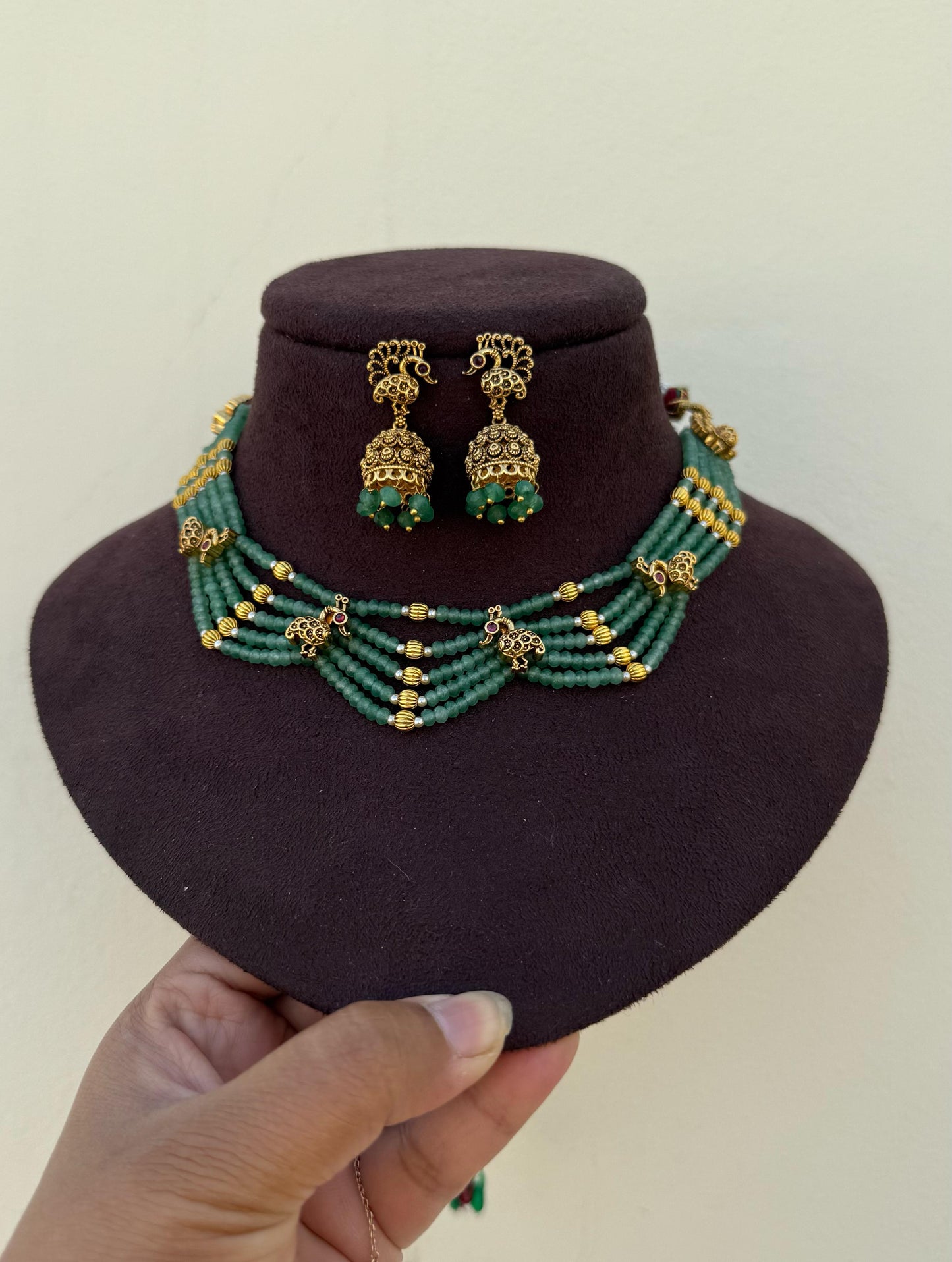 Five layered peacock embossed desiner necklace with jhumkas