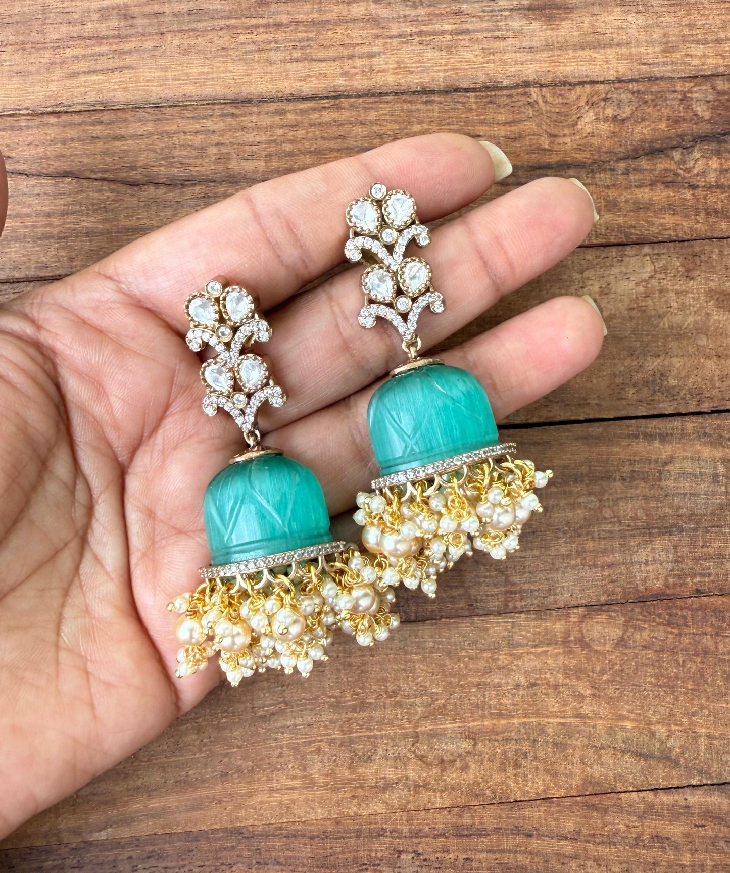 Rosegold flower embossed double layered pearl hanging jhumkas