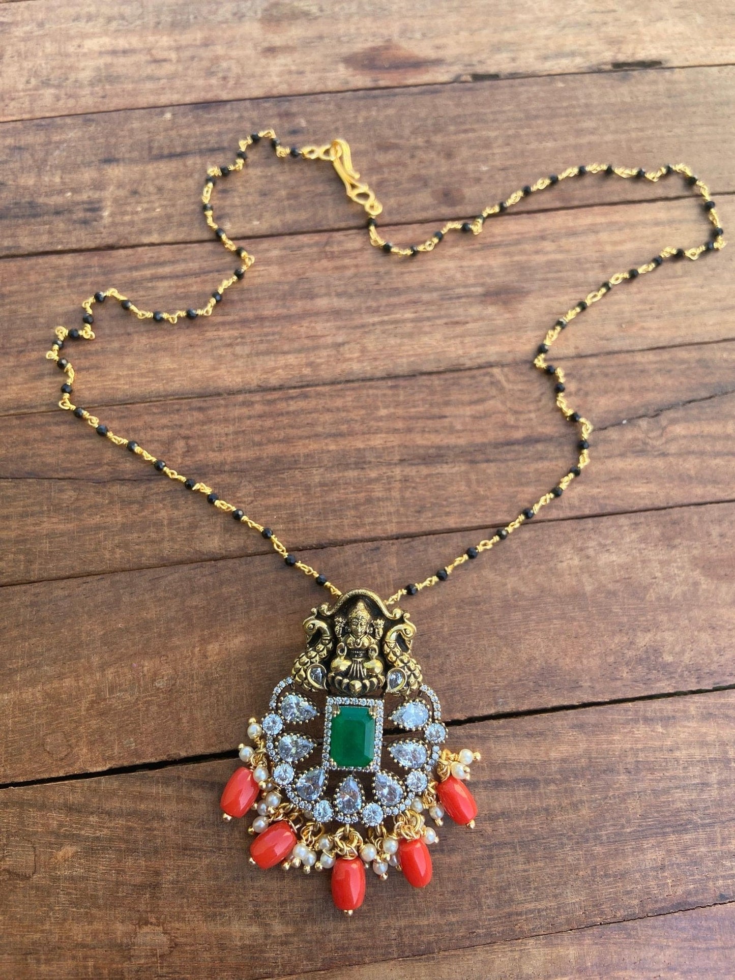 Coral Lakshmi Devi locket with black beads - Alluring Accessories