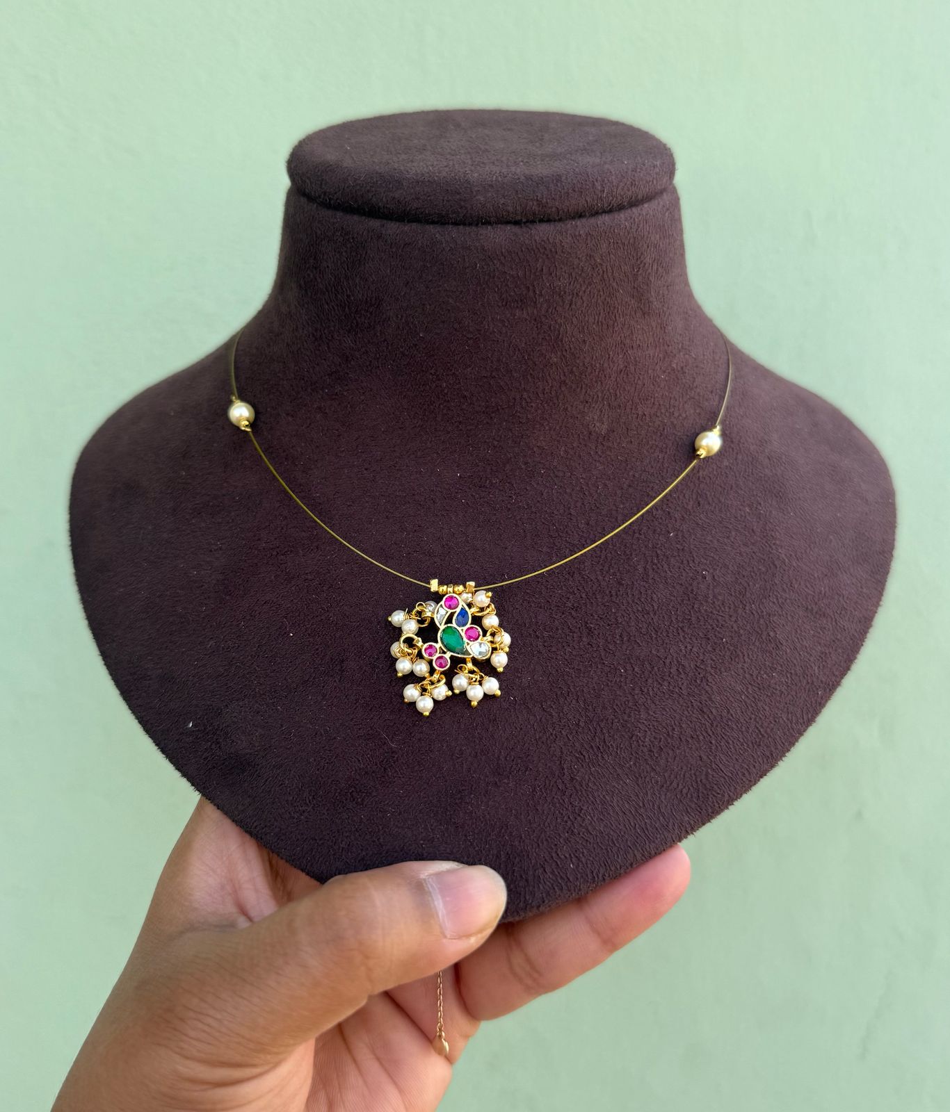 Colourful peacock invisible necklace