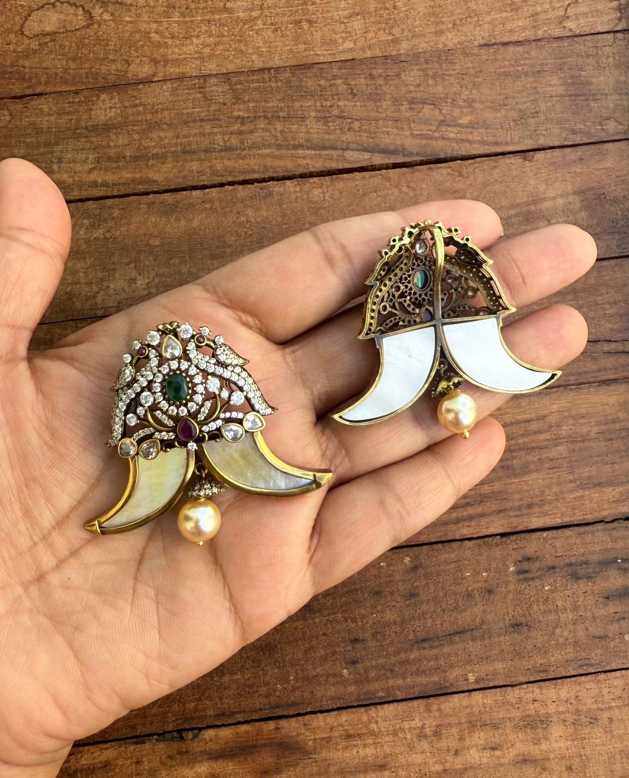 Dual peacock pulighore locket