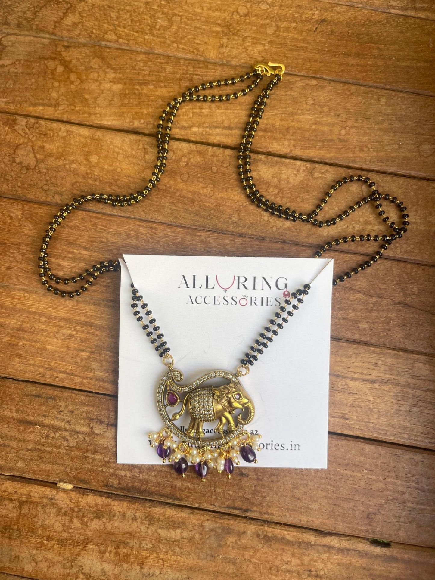 Mango shaped elephant two layered black beads - Alluring Accessories