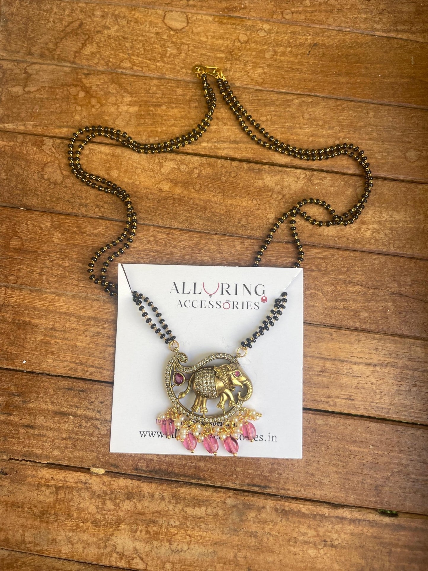 Mango shaped elephant two layered black beads - Alluring Accessories