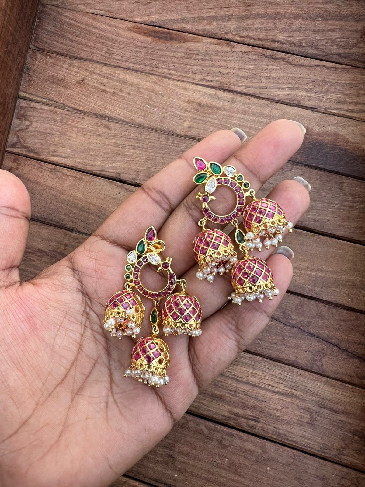 Three jhumka kemp earrings