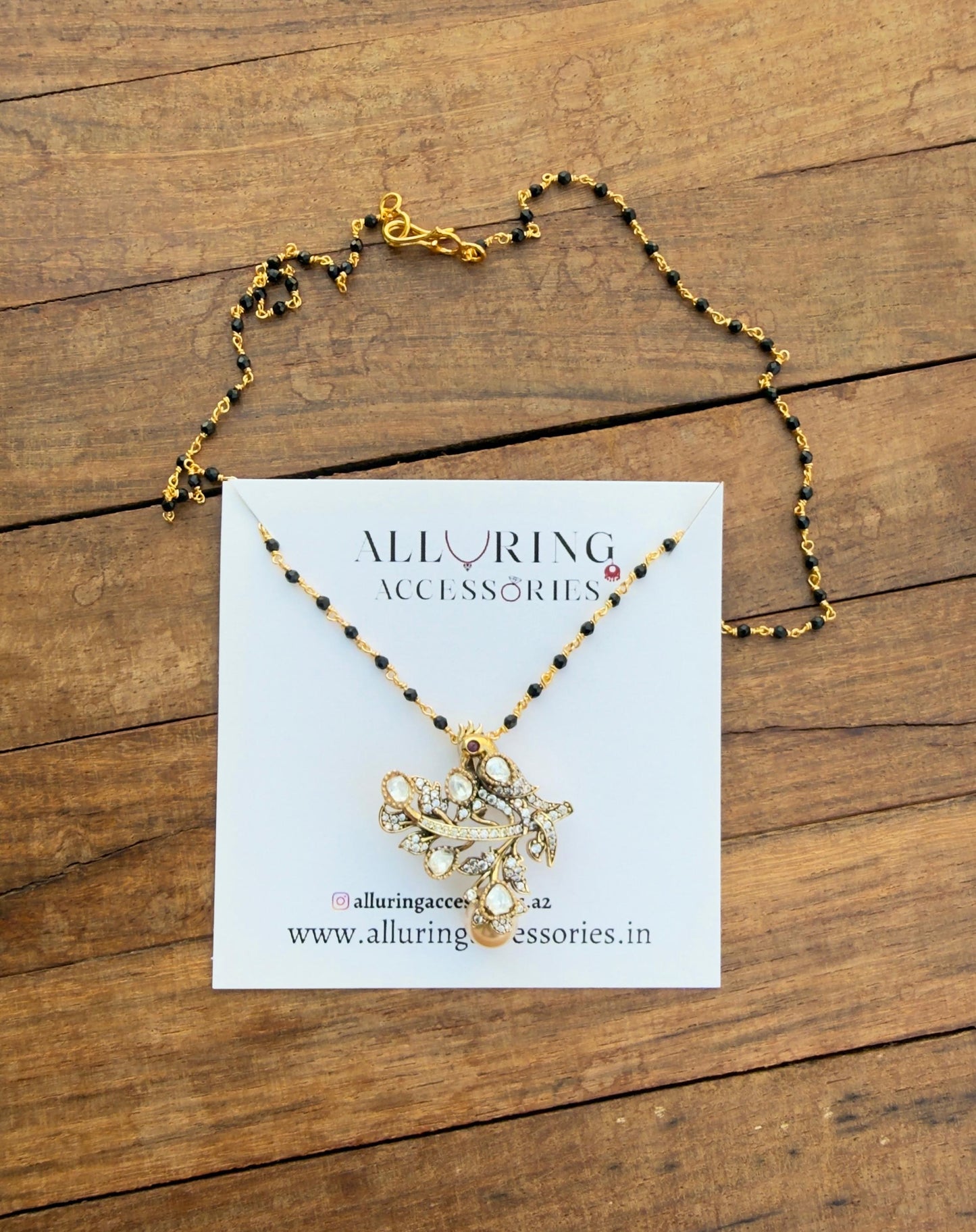 Moissanite pearl bird locket with or without black beads