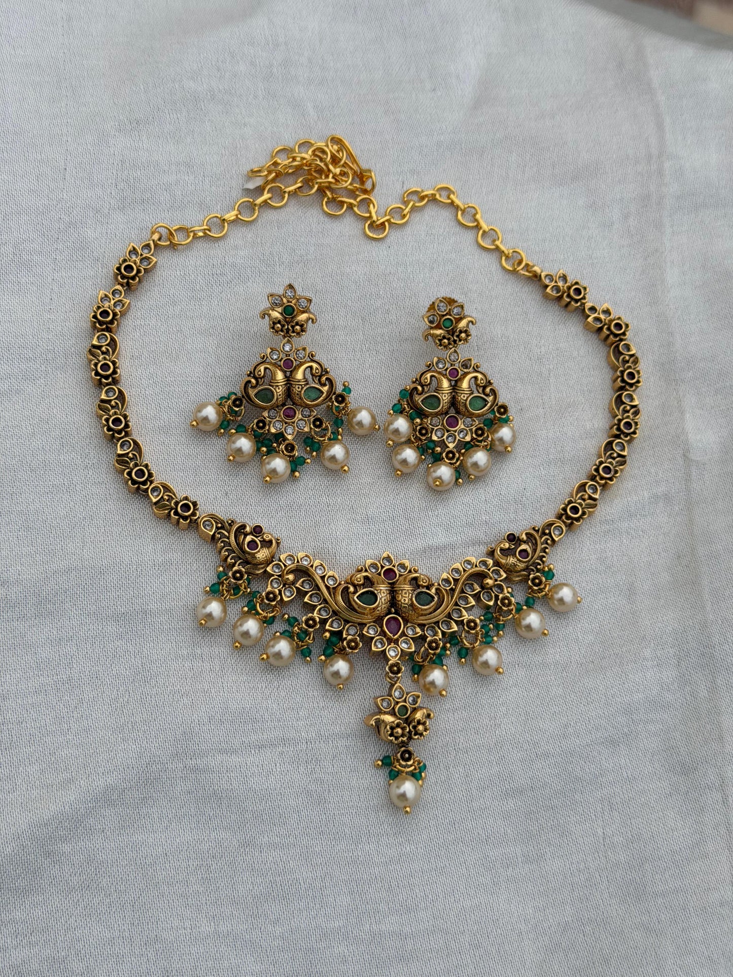 Four peacock mango flower gold necklace with chandbalis