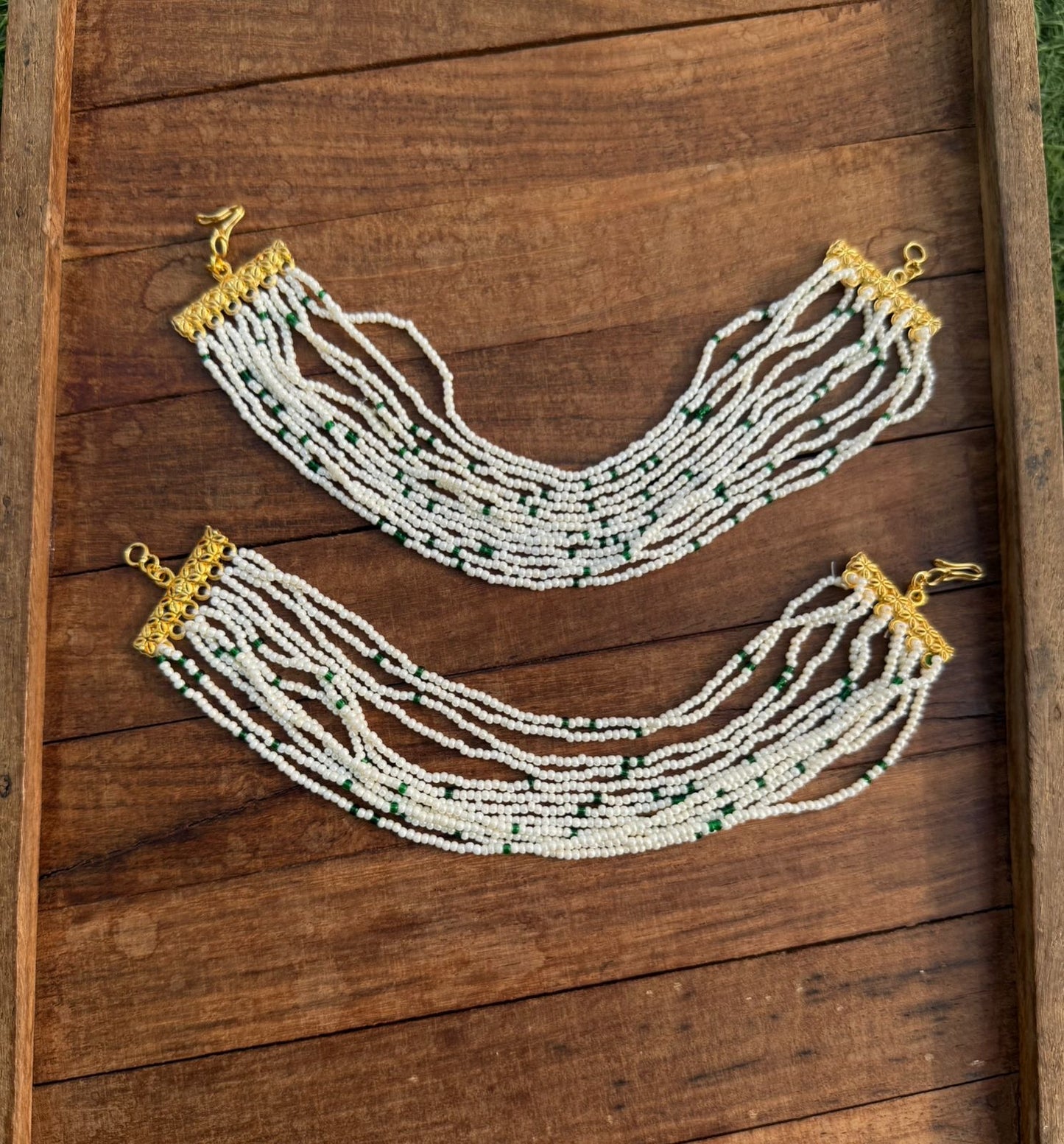 499 heavy pearl maatis with green sugar beads