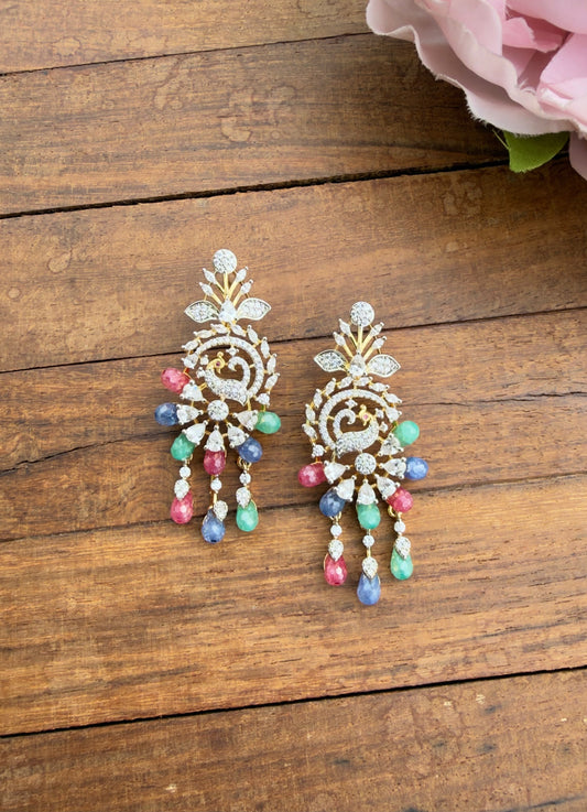 Diamond look alike peacock earrings with tri colour drops