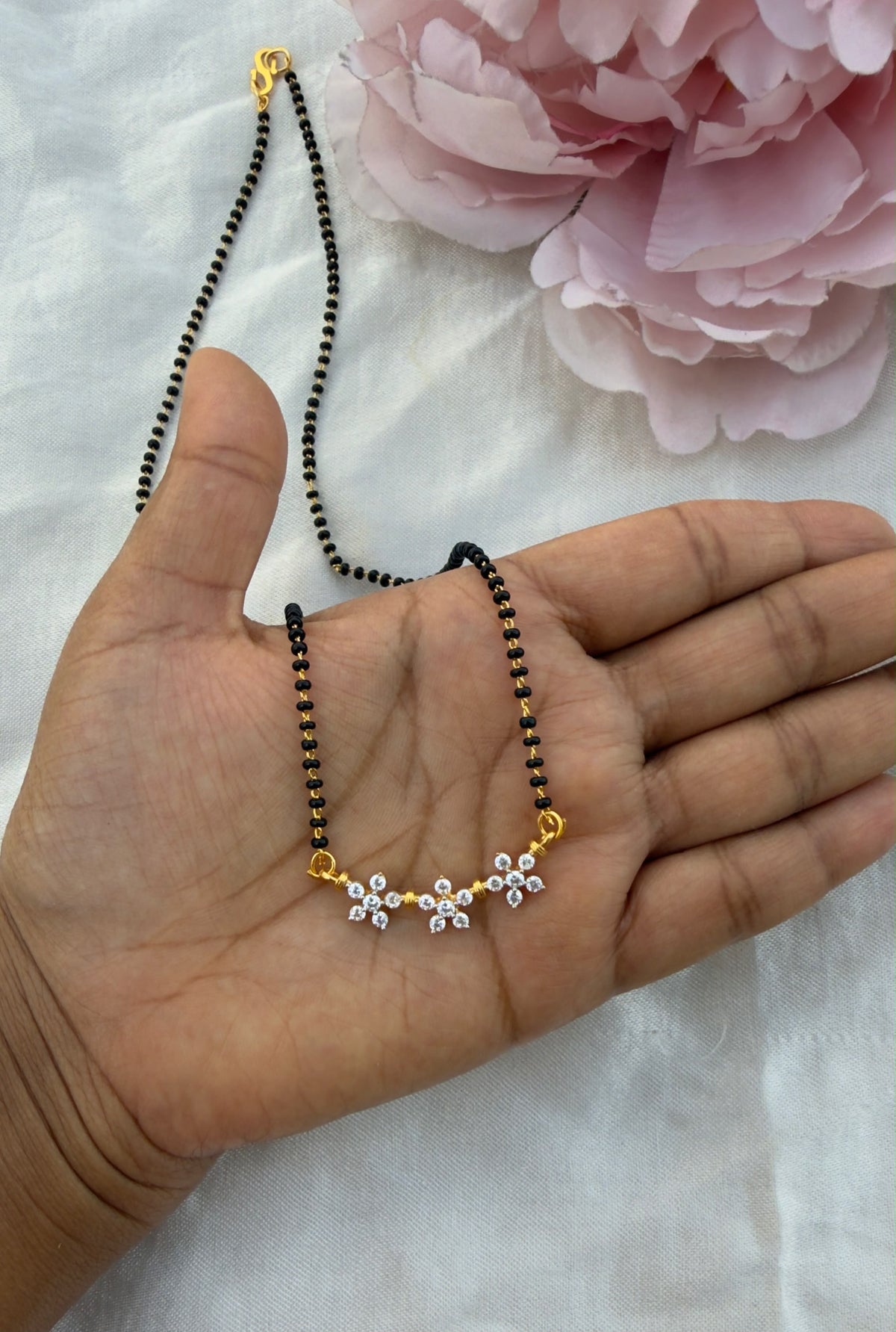 92.5 silver three flower diamond finish black beads necklace