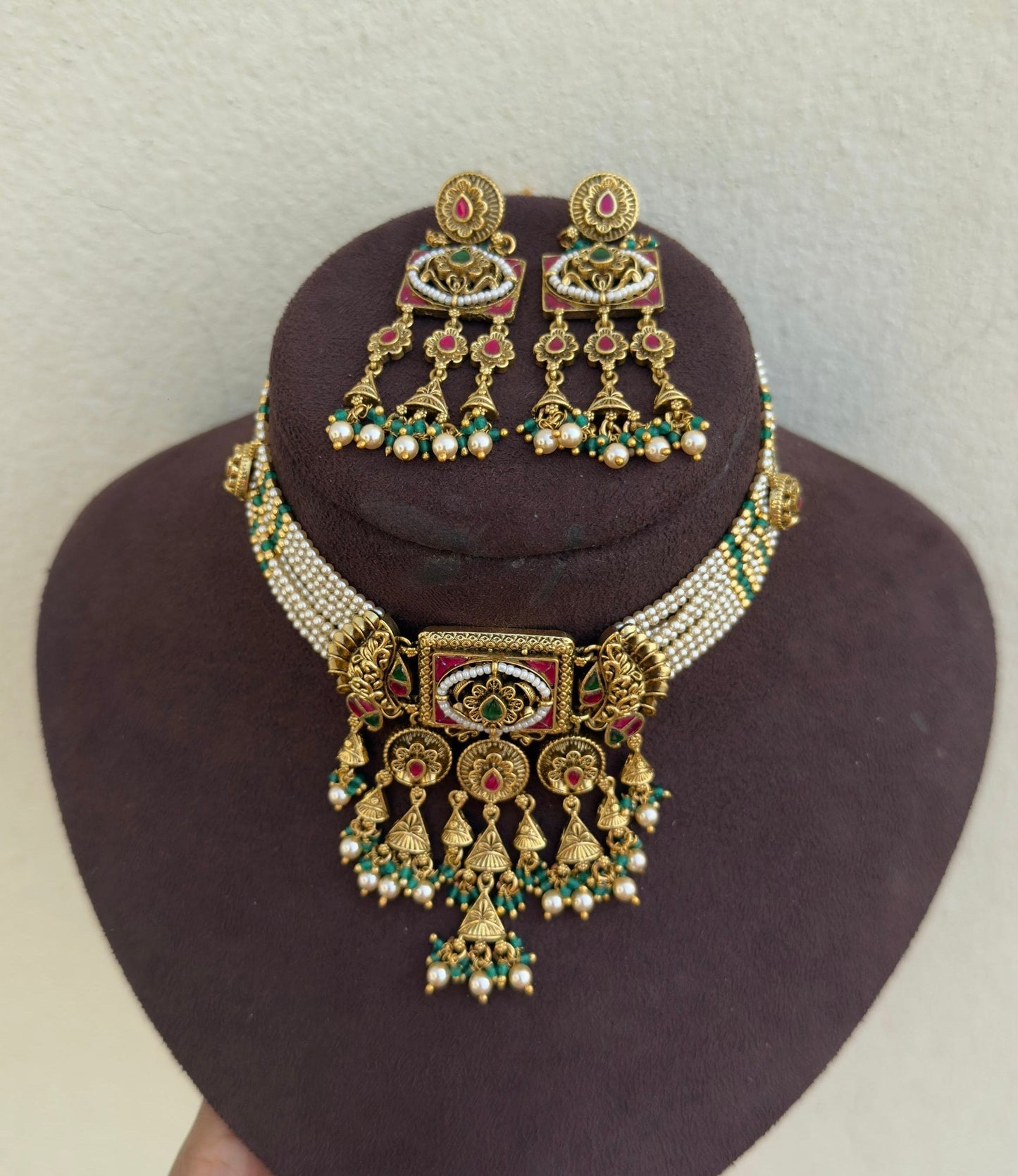 Nine line heavy pearl real kundan antique choker with beautiful hanging earrings