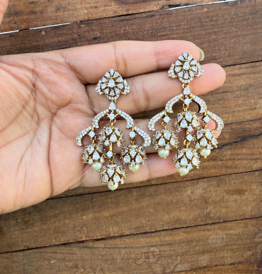 Four zircon AD stone jhumkas