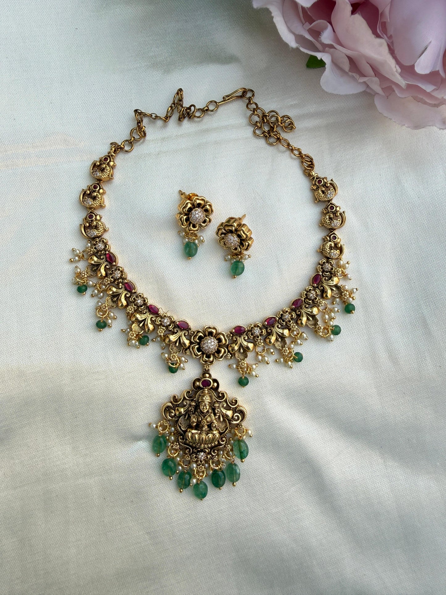 Beautiful lakshmi devi intricate peacock flower stud necklace