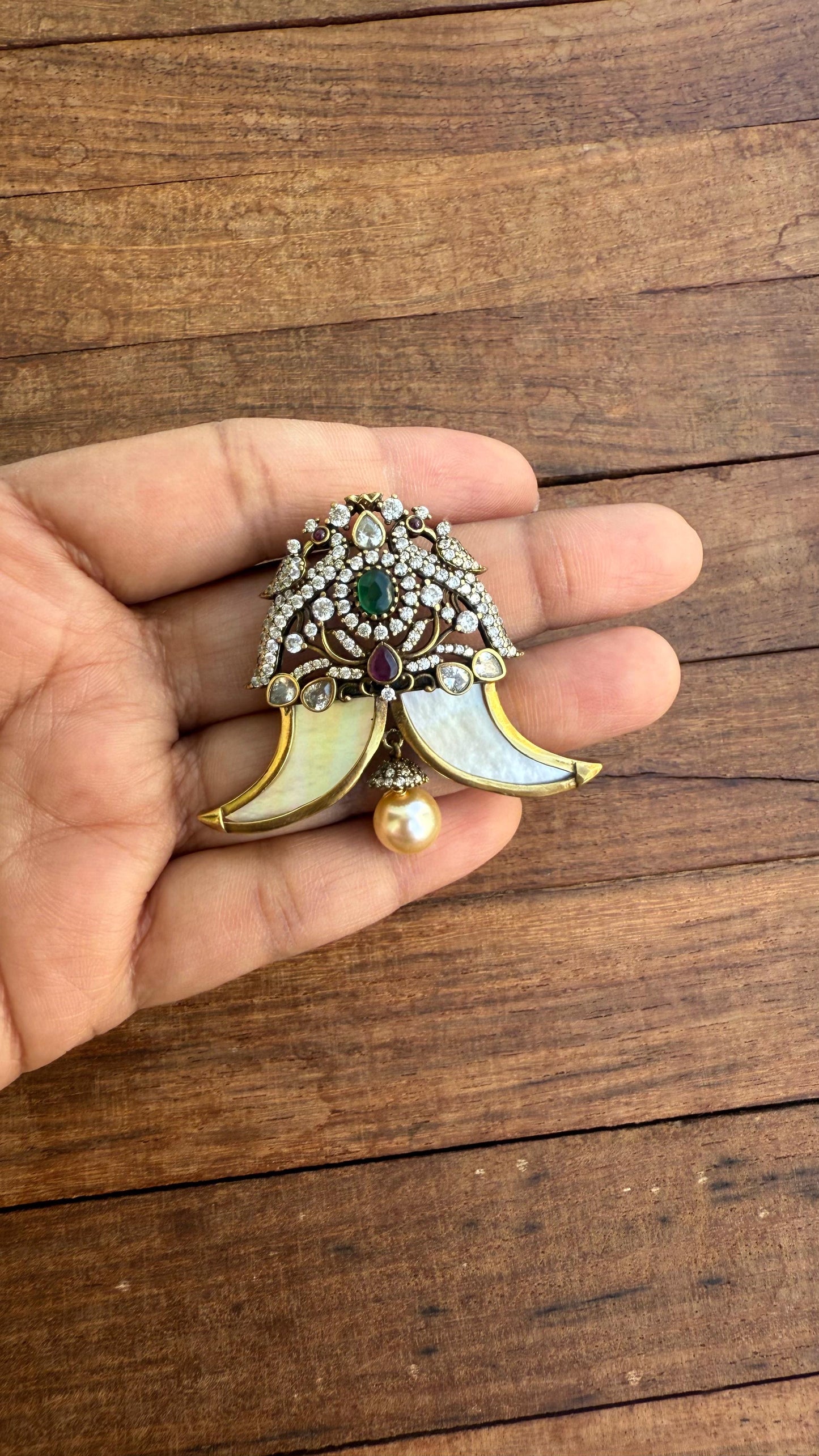 Dual peacock pulighore locket