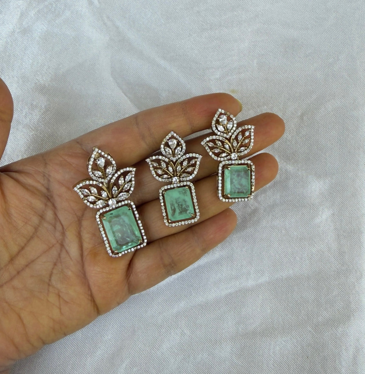 Beautiful diamond leaf doublet stone locket with earrings