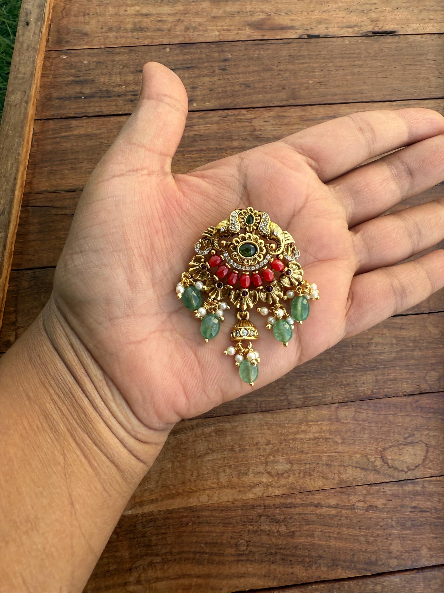 Dual elephant coral locket