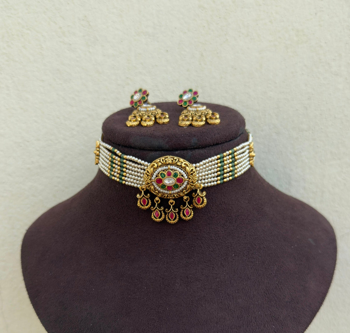 Seven line oval heavy pearl real kundan antique choker with beautiful hanging earrings