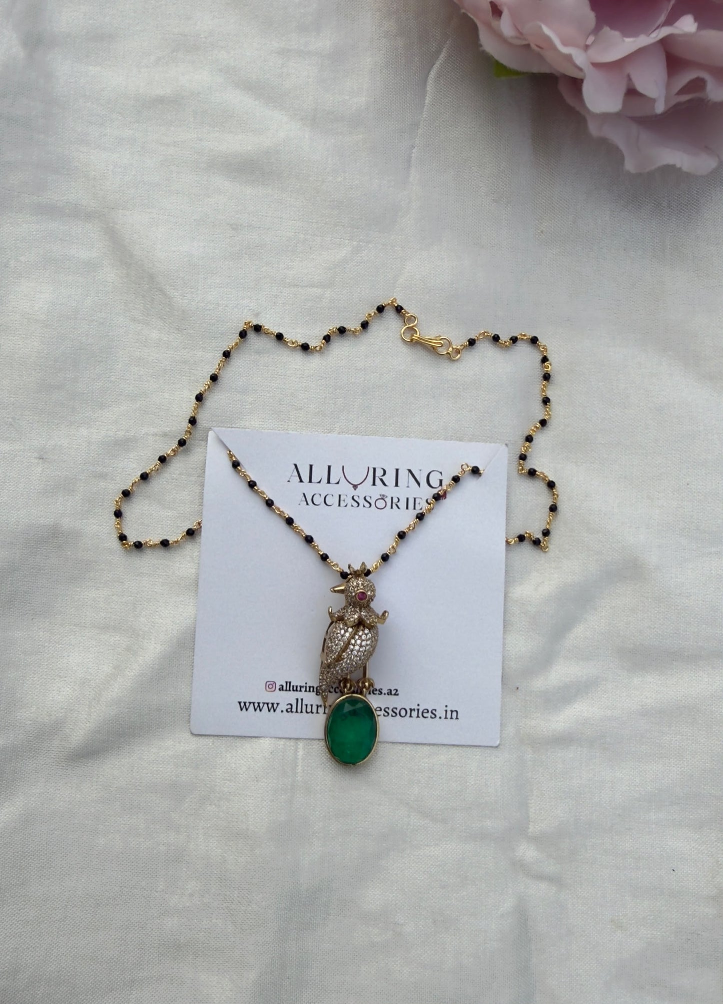Full of stones Parrot emerald locket