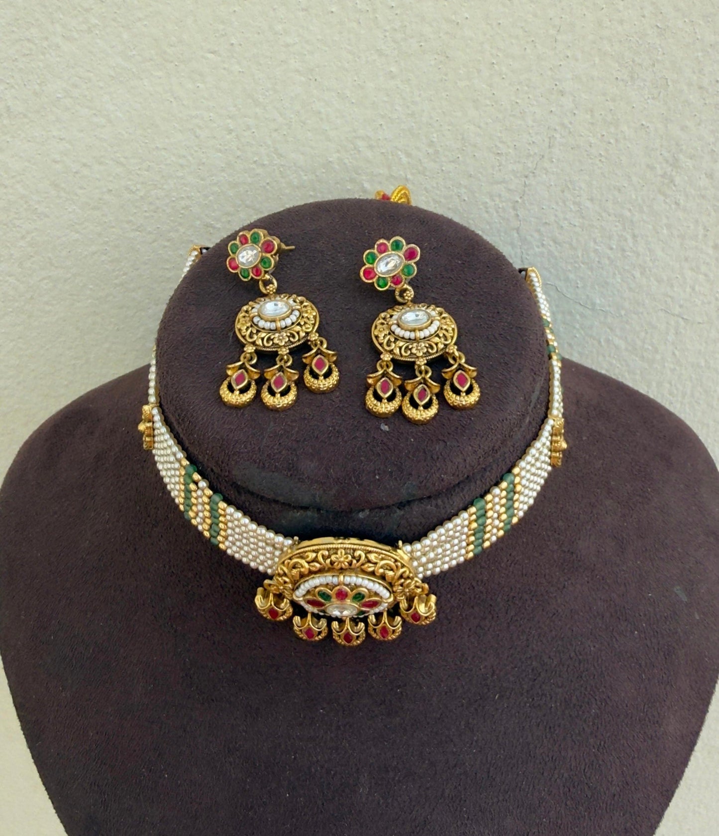 Seven line oval heavy pearl real kundan antique choker with beautiful hanging earrings
