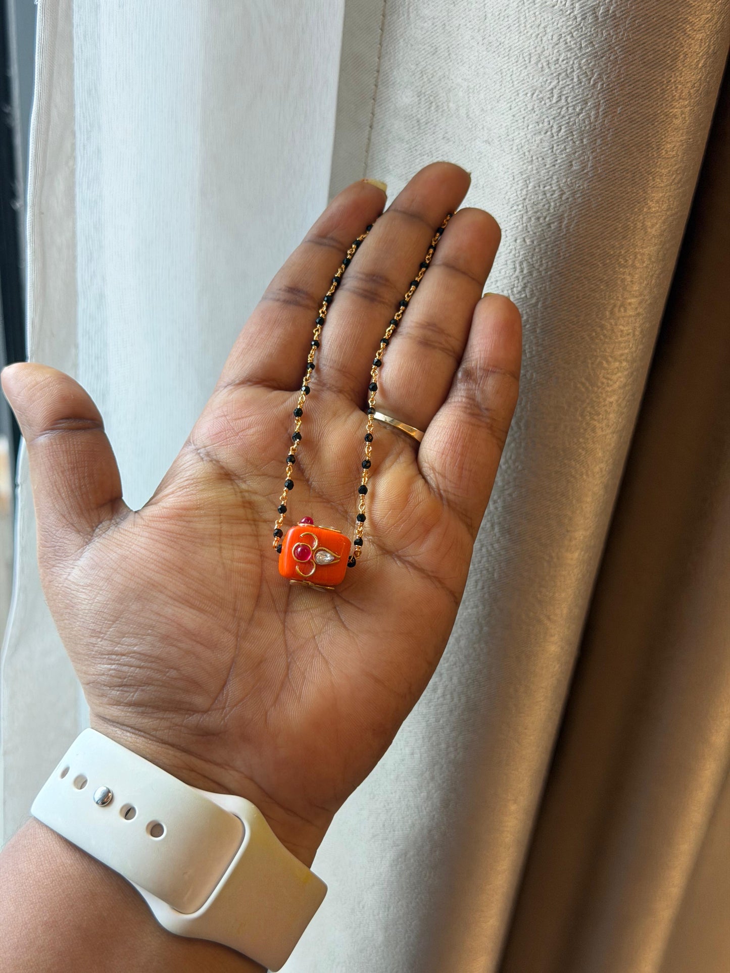 Square coral kundan locket gold and black beads necklace