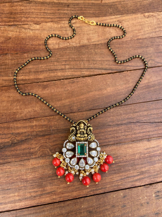 Coral Lakshmi Devi locket with black beads - Alluring Accessories