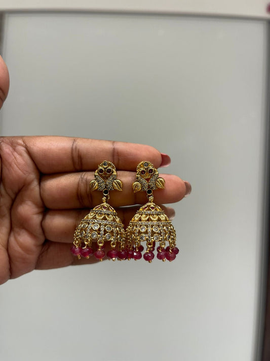 Dual peacock gold jhumkas - Alluring Accessories