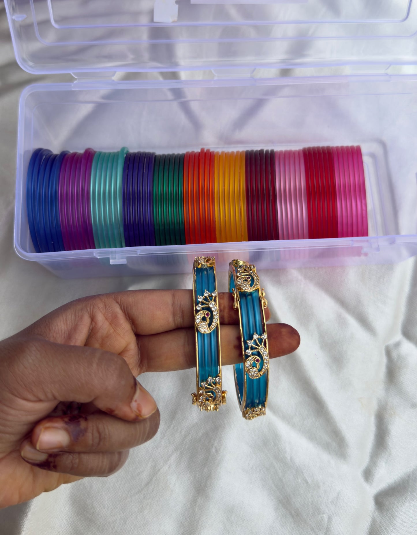 Pack of 12 changeable gold look alike peacock bangles