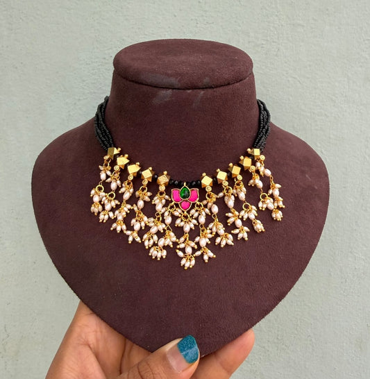 Heavy pearl hanging lotus real kundan black beads necklace