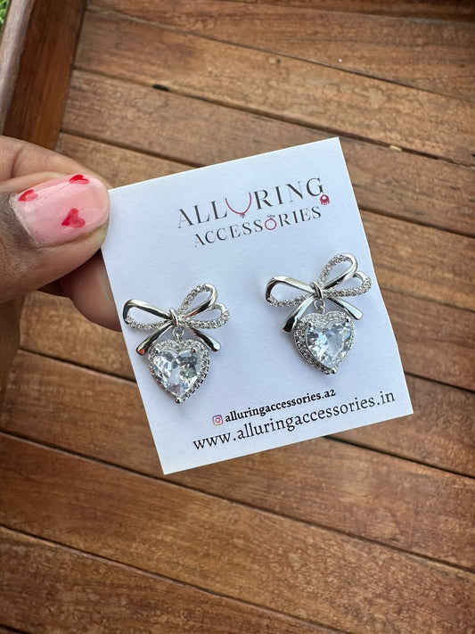 Bow heart silver studs - Alluring Accessories