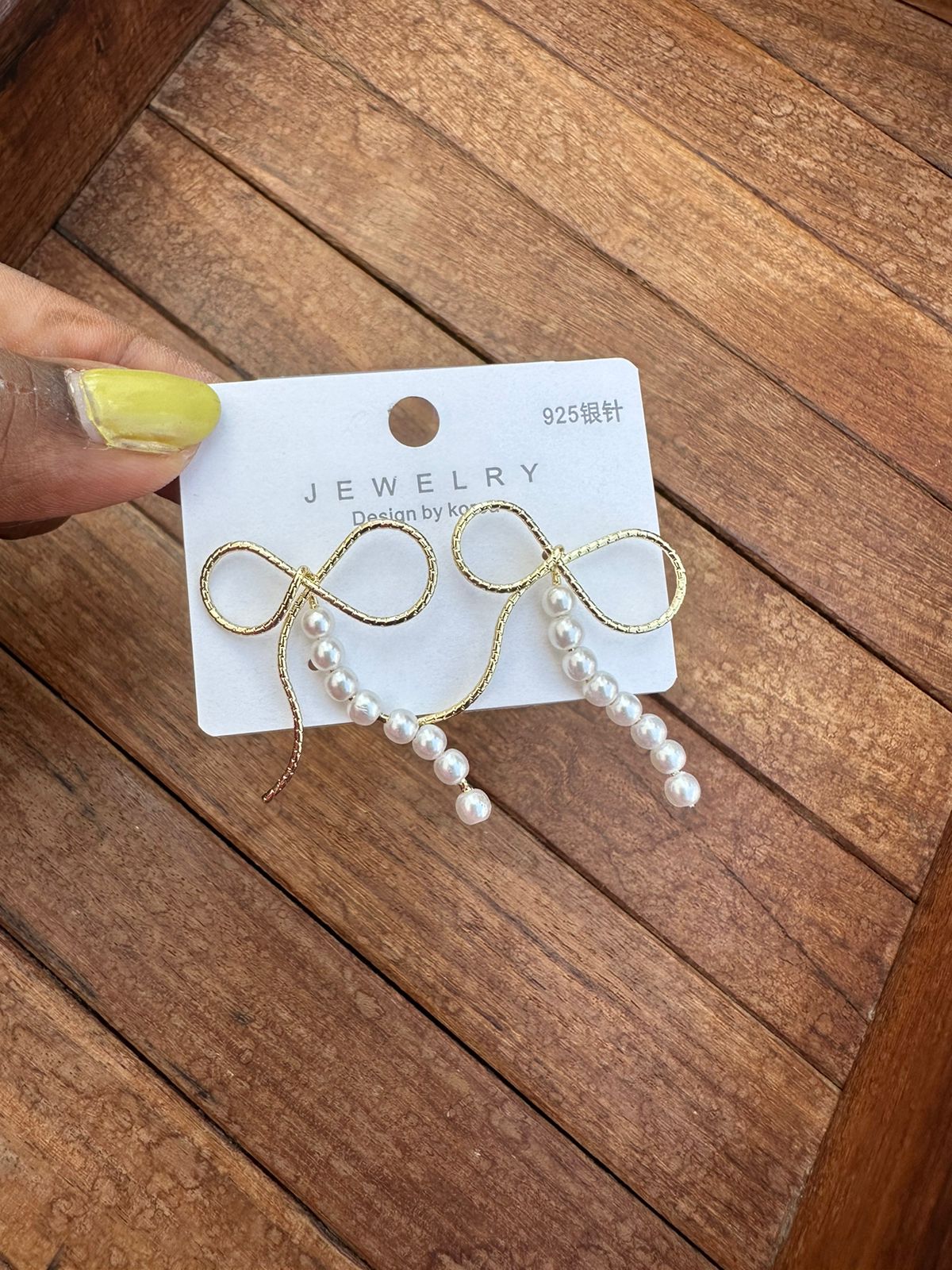 Bow side pearl hanging earrings - Alluring Accessories