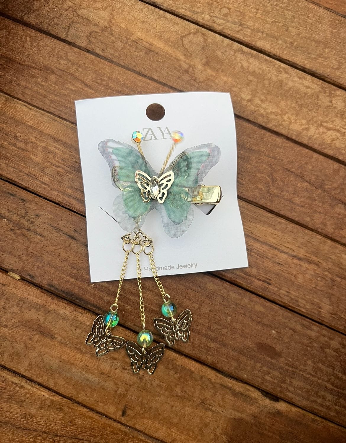 Butterfly moving hanging alligator clip - Alluring Accessories