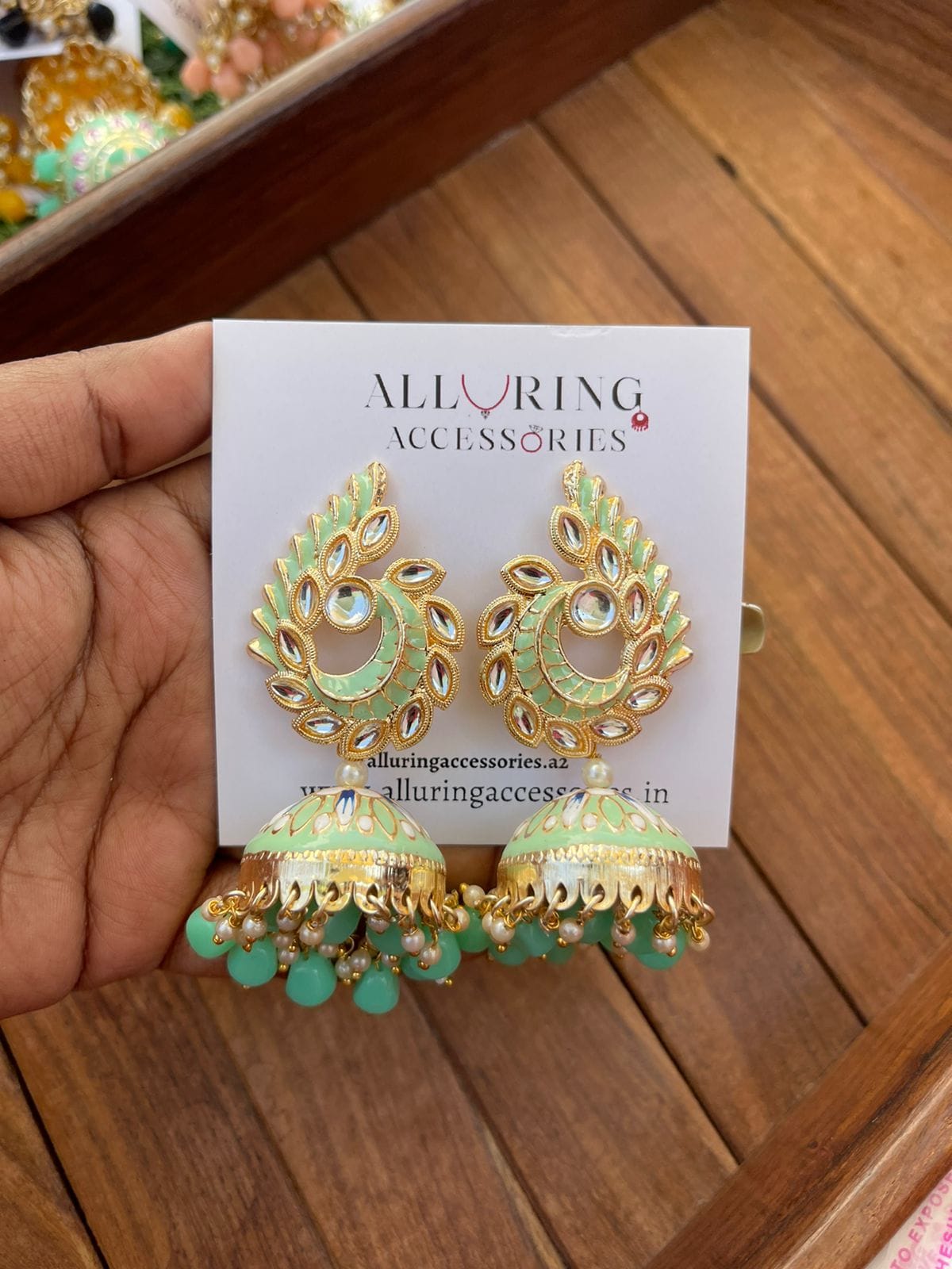 Kundan peacock meenakari jhumkas - Alluring Accessories