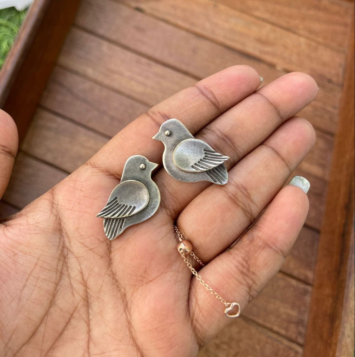 Silver look alike parrot studs - Alluring Accessories