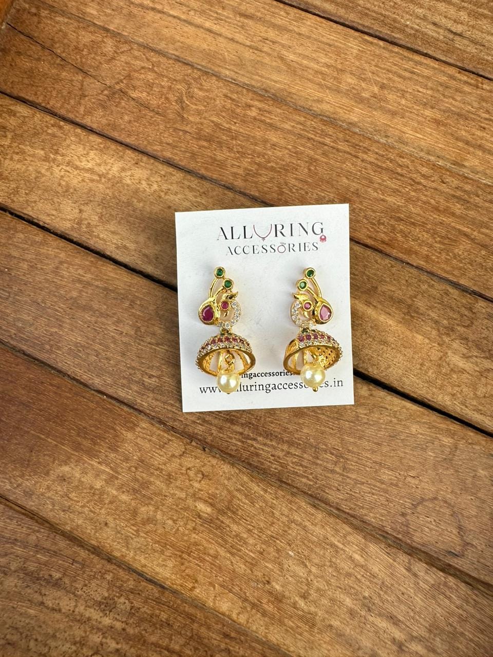 Small peacock gold jhumkas - Alluring Accessories