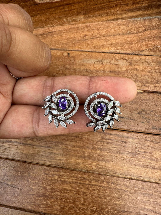 Spiral leaf purple studs - Alluring Accessories